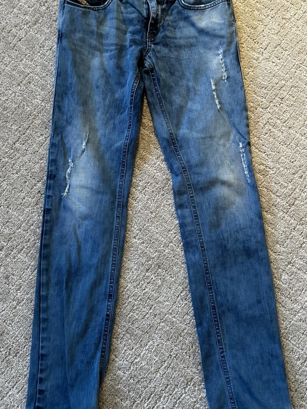 Diesel Skinny Jeans in Washed Blue with Distressed Accents